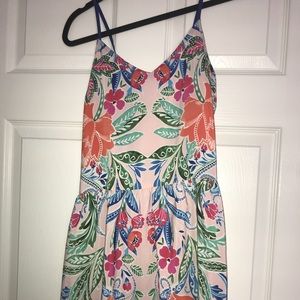 Backless, tied mini dress. Perfect for summer